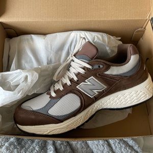 New Balance 2002R 
Color: Brown/Beige
Size: Men’s 8.5 Women’s: 10.5